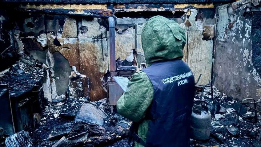Следственные действия в сгоревшем гараже
